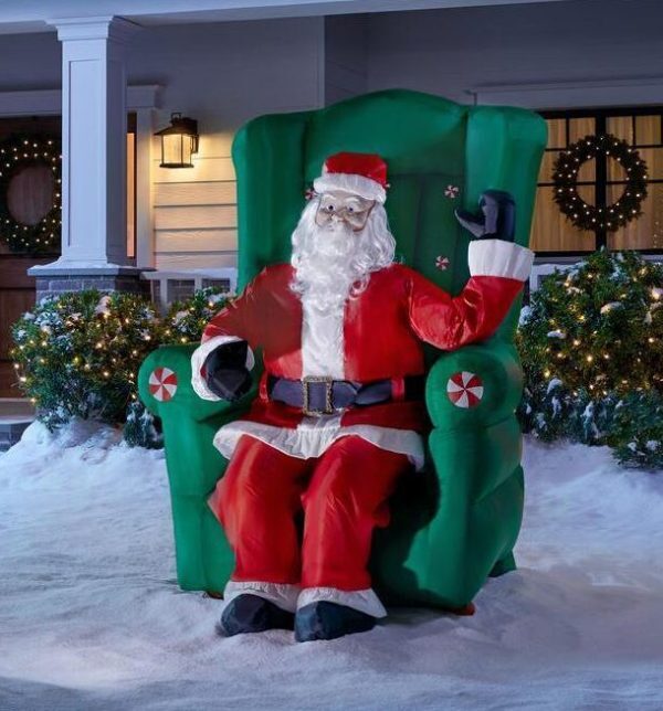 Christmas5 5 ft realistic animated inflatable santa in high back chai